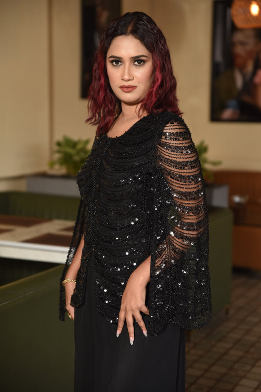 BLACK EMBELLISHED SEQUIN TOP PAIRED WITH WIDE-LEG TROUSERS